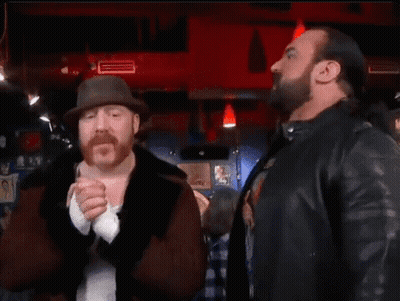 Two Men Are Standing Next To Each Other And The Word Banger Is On The Bottom GIF