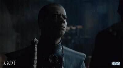 Two Men Are Standing Next To Each Other And The Word Got Is On The Bottom Right GIF