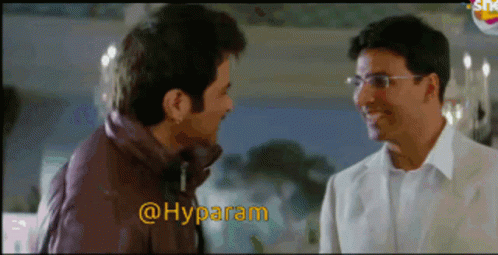 Two Men Are Standing Next To Each Other And The Words @Hyparam Are On The Screen GIF