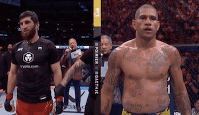 Two Men Are Standing Next To Each Other In A Boxing Ring And One Has A Shirt That Says Crypto.com On It GIF