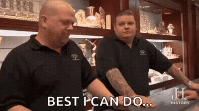 Two Men Are Standing Next To Each Other In A Jewelry Store . GIF