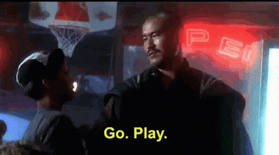 Two Men Are Standing Next To Each Other In Front Of A Sign That Says Pepsi GIF