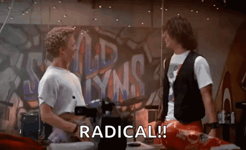 Two Men Are Standing Next To Each Other In Front Of A Wall With Graffiti On It And One Of Them Is Holding A Guitar . GIF