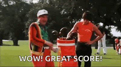 Two Men Are Standing Next To Each Other On A Golf Course And One Of Them Is Holding A Golf Bag . GIF