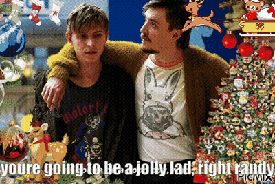 Two Men Are Standing Next To Each Other With A Christmas Tree In The Background GIF
