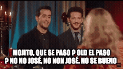Two Men Are Standing Next To Each Other With A Woman Behind Them And A Caption That Says Mojito GIF