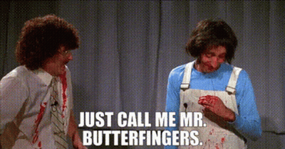 Two Men Are Standing Next To Each Other With Blood On Their Faces And One Of Them Is Holding A Knife . GIF