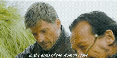 Two Men Are Standing Next To Each Other With One Saying In The Arms Of The Woman I Love GIF
