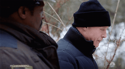 Two Men Are Standing Next To Each Other With The Hashtag #Chicagopd On The Bottom GIF