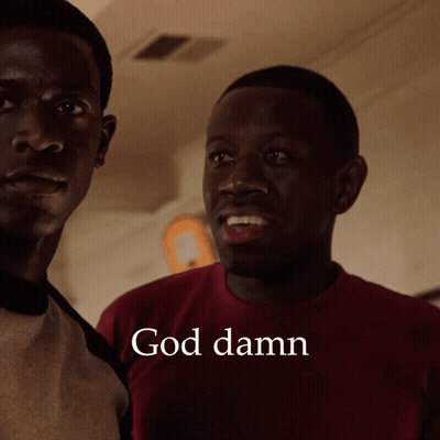 Two Men Are Standing Next To Each Other With The Words God Damn On The Bottom GIF