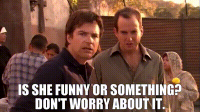 Two Men Are Standing Next To Each Other With The Words Is She Funny Or Something ? Don 'T Worry About It GIF