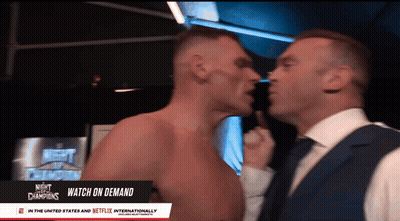 Two Men Are Standing Next To Each Other With The Words Night Of The Champions In The Upper Left Corner GIF