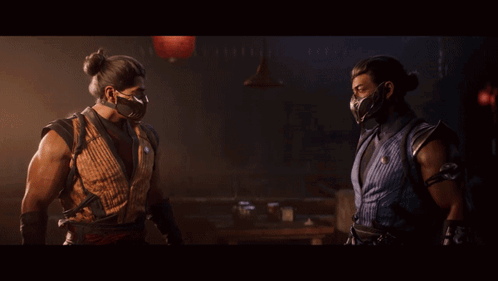 Two Men Are Standing On A Balcony Looking At A Sunset GIF