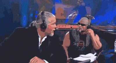 Two Men Are Talking In Front Of A Sign That Says S Champ GIF