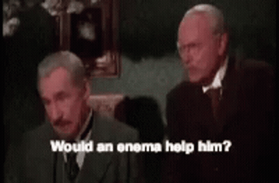 Two Men Are Talking To Each Other And One Of Them Is Asking If An Enema Would Help Him GIF