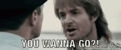 Two Men Are Talking To Each Other And One Of Them Is Asking The Other If He Wants To Go . GIF