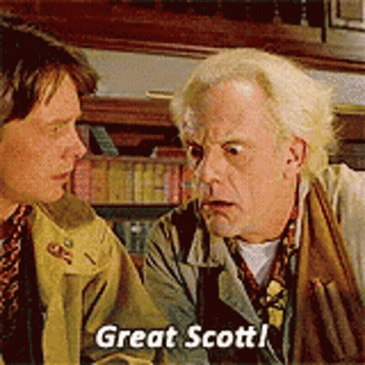 Two Men Are Talking To Each Other And One Of Them Is Saying Great Scott GIF