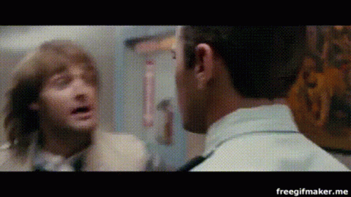 Two Men Are Talking To Each Other In A Room And The Words Freegifmaker.me Are On The Bottom Right GIF
