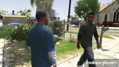 Two Men Are Walking Down A Sidewalk In A Video Game With Make A Gif.com At The Bottom Of The Screen GIF