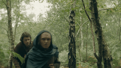 Two Men Are Walking Through A Forest With Hbo Written On The Bottom GIF