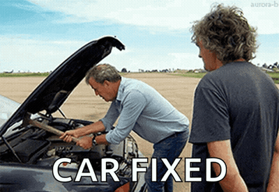 Two Men Are Working On A Car With The Words Car Fixed Written Below Them GIF