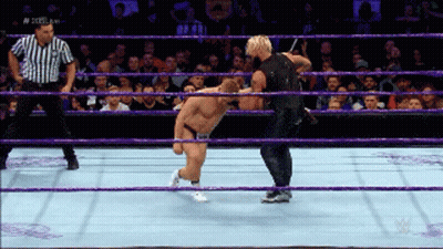 Two Men Are Wrestling In A Ring With A Referee And The Words N Steel King On The Bottom GIF