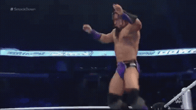Two Men Are Wrestling In A Ring With The Words Smackdown On The Bottom GIF