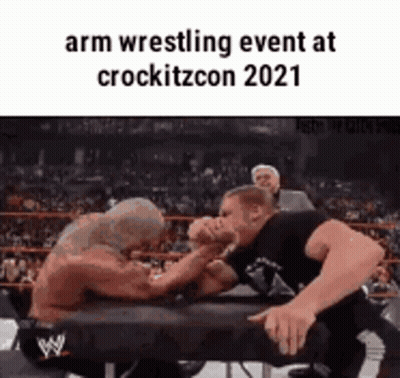 Two Men Arm Wrestling In Ring GIF