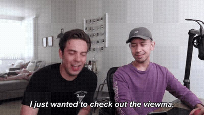Two Men At Microphone Talking GIF