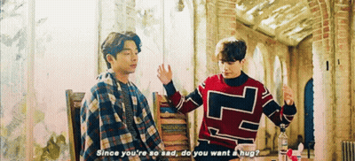 Two Men At Table One Says Since You're So Sad Do You Want A Hug GIF