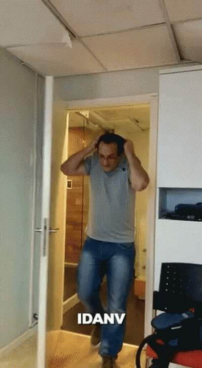 Two Men At Table One With Coca Cola Blue Box GIF