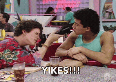 Two Men At Table Saying Yikes GIF