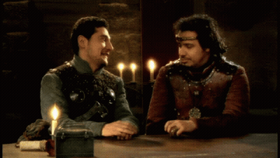 Two Men At Table With Candles Vous Pouvez Vous Calmer GIF