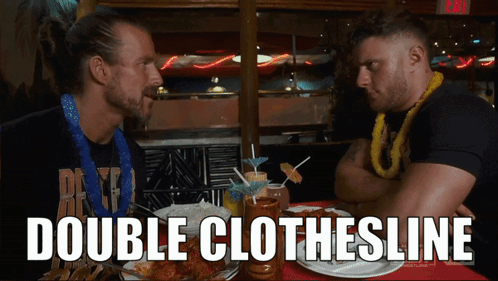 Two Men At Table With Food And Double Clothesline GIF