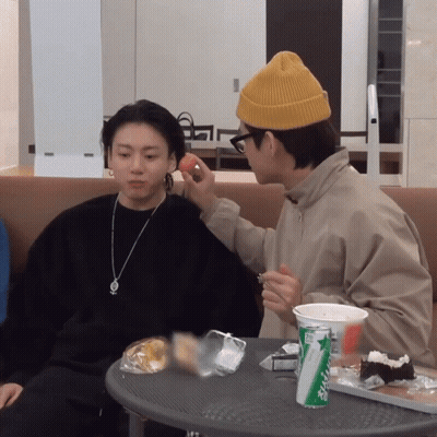 Two Men At Table With Sprite Can GIF