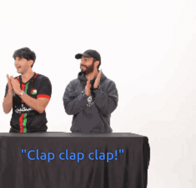 Two Men Behind Table Saying Clap Clap Clap GIF