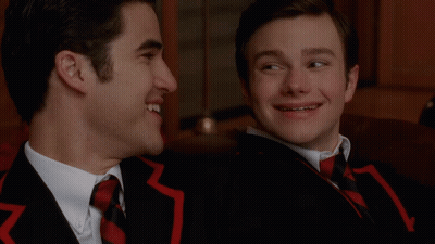 Two Men Beside Rally Poster GIF