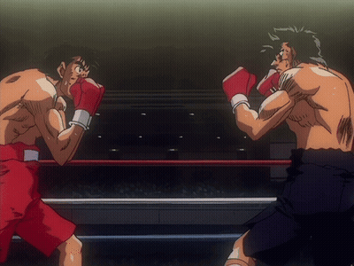 Two Men Boxing In Ring One In Red Shorts GIF