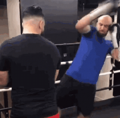 Two Men Boxing In Ring GIF
