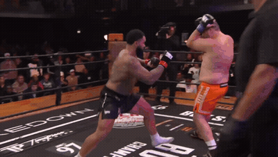 Two Men Boxing In Ring With Edown Sign GIF