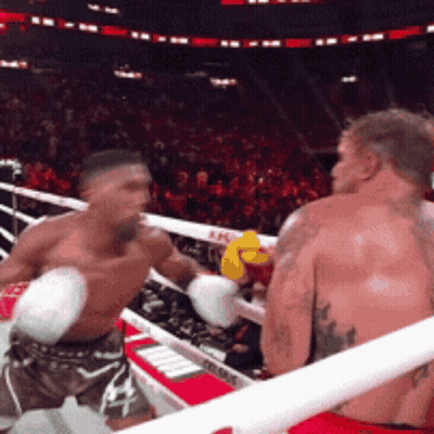 Two Men Boxing In Ring With Yellow Glove GIF