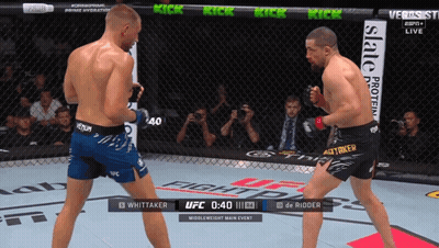 Two Men Boxing In UFC Fight Pass Ring GIF