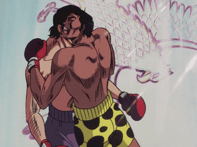 Two Men Boxing, One In Yellow Polka Dot Shorts GIF