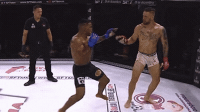 Two Men Boxing One With Jesus Chest Tattoo GIF