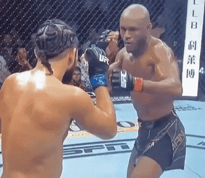 Two Men Boxing One With Main Shorts GIF