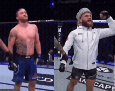 Two Men Boxing Ring One White UFC Jacket GIF