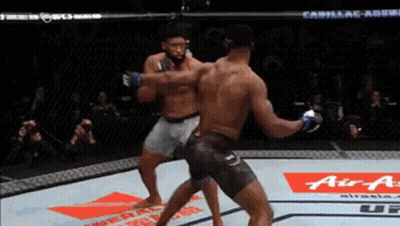 Two Men Boxing With Cadillac Ad GIF