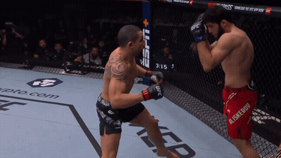 Two Men Boxing With Monster Energy Logo GIF