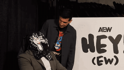 Two Men By AEW Hey Sign GIF