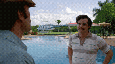 Two Men By Pool With Helicopter GIF